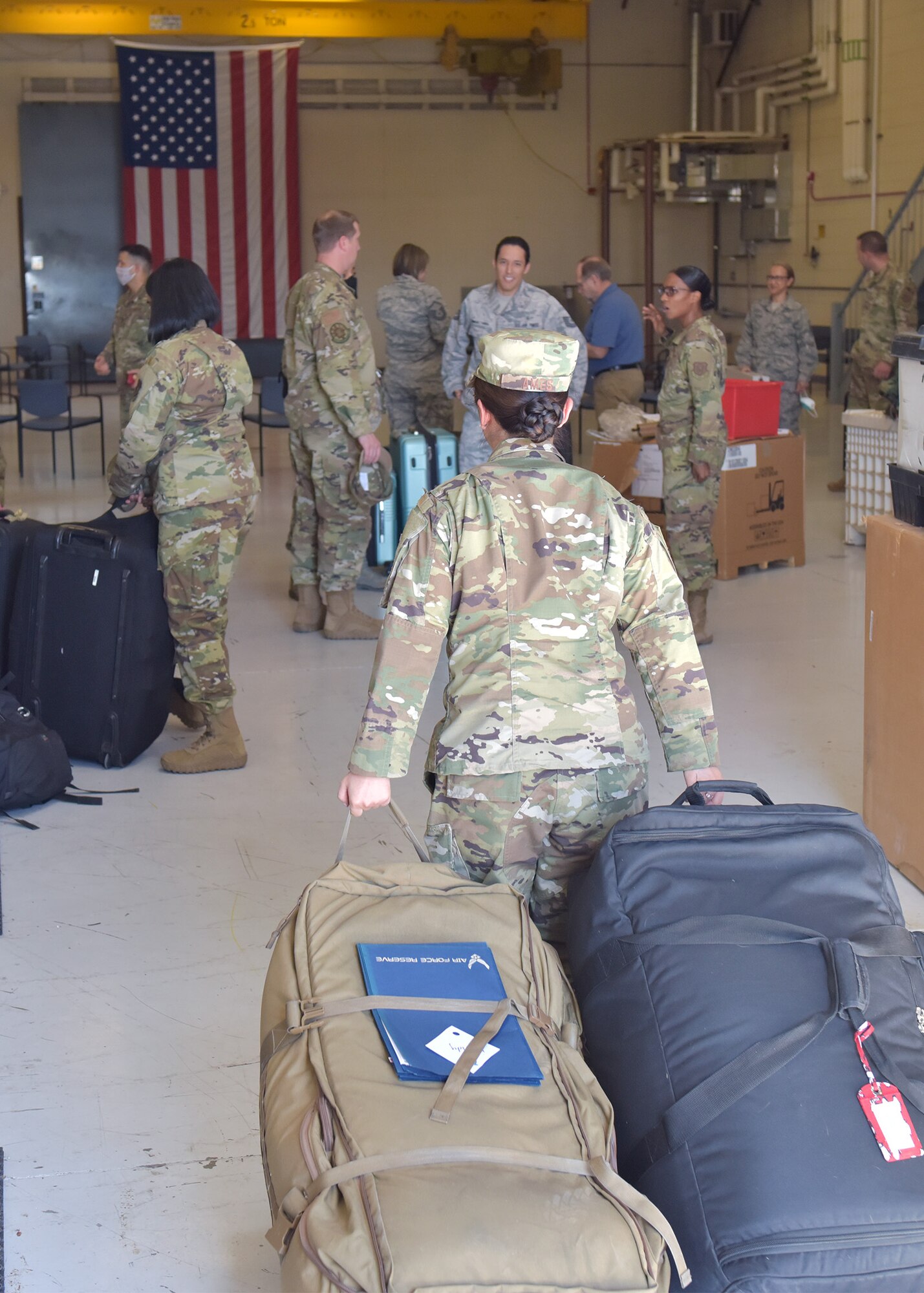 944th Medical and Aeromedical Staging Squadron Reserve Citizen Airmen arrive at the 944th Logistics Readiness Squadron April 22 at Luke Air Force Base, Ariz. Over a dozen 944th Fighter Wing medics were tasked to aid in Coronavirus response in and around New York City. (U.S. Air Force photo by Tech. Sgt. Louis Vega Jr.)