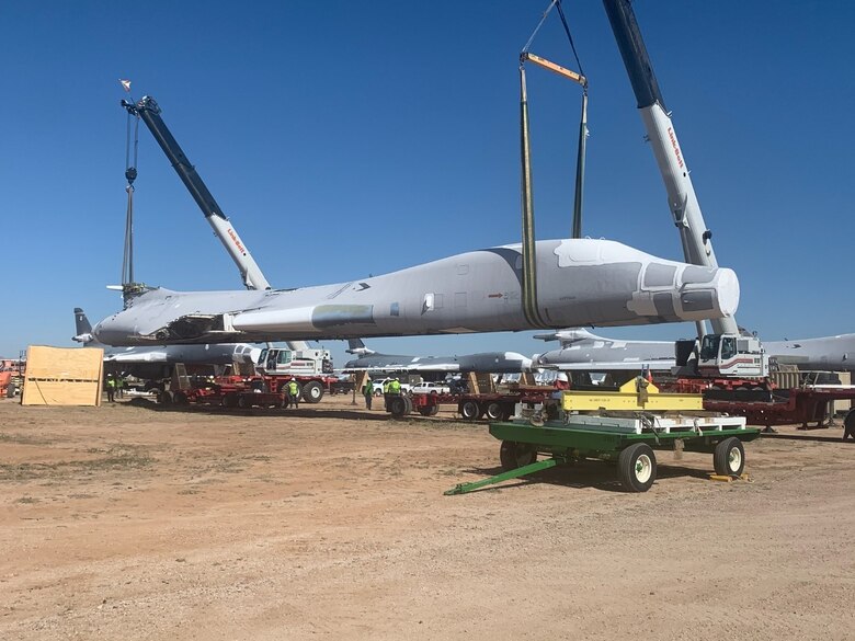 B-1B tail #85-0092 is lifted and placed on flatbed trailers for the 1,000 mile journey to Wichita, Kansas.  The National Institute for Aviation Research at Wichita State University will scan every part of the aircraft to create a digital twin that can be used for research.  (US Air Force Photo)