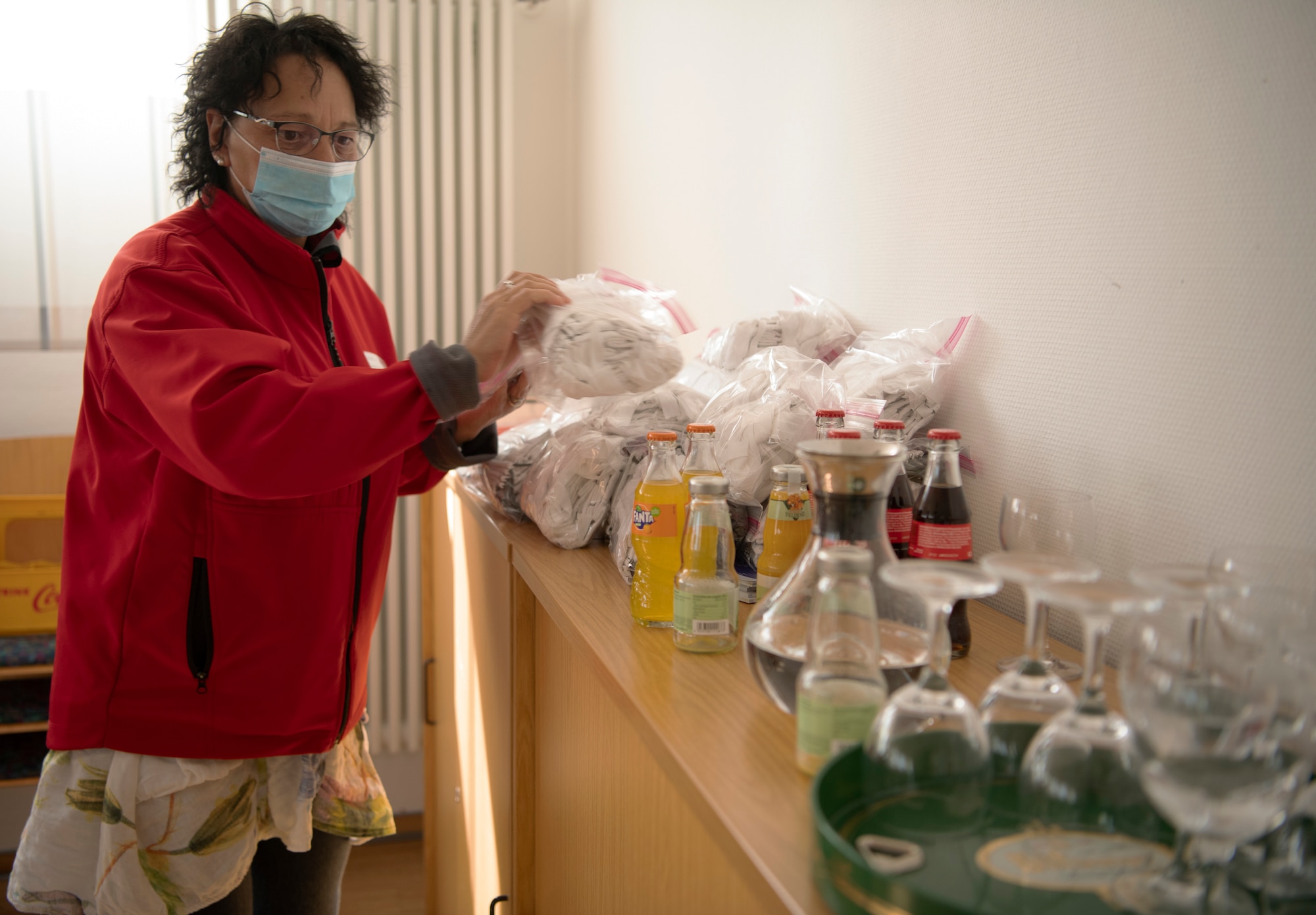 Red Cross members donated 500 face masks made by 52nd Fighter Wing volunteers to the community in an effort to stop the spread of COVID-19