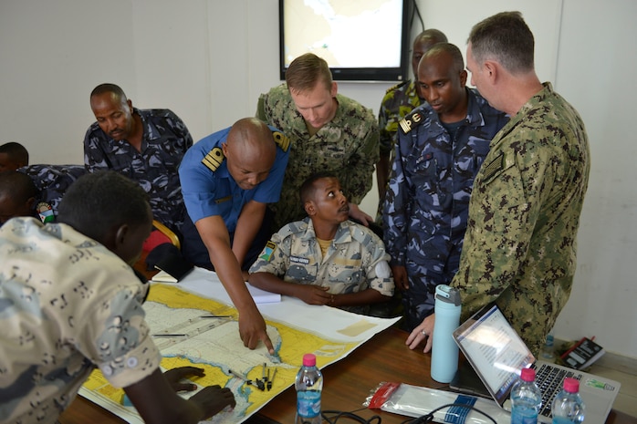 Cutlass Express 19.2 participants plot a course during a tabletop exercise in Djibouti, Djibouti, Oct. 30, 2019.