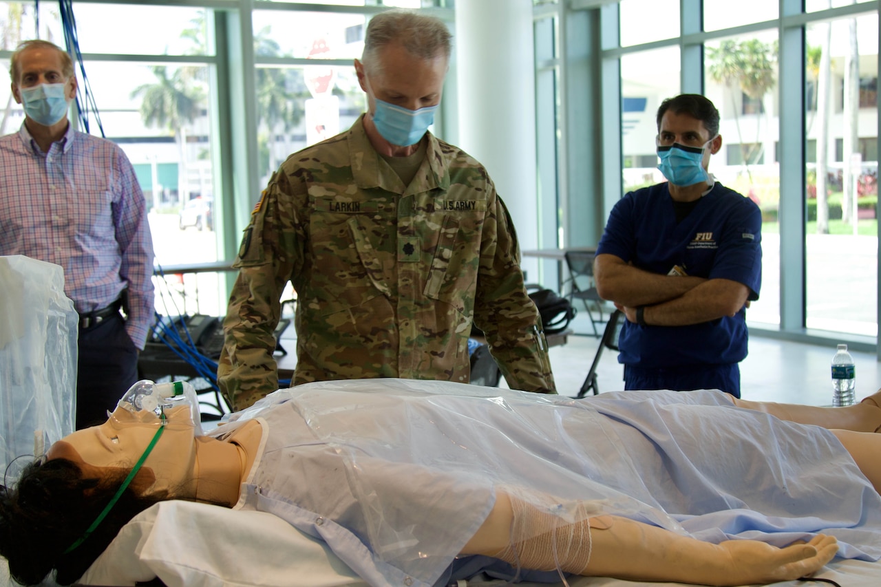 Doctors, nurses and medics from the Florida National Guard joined Florida International University at the Miami Beach Convention Center to conduct training in preparation to staff the center in the event it is needed in response to COVID-19.