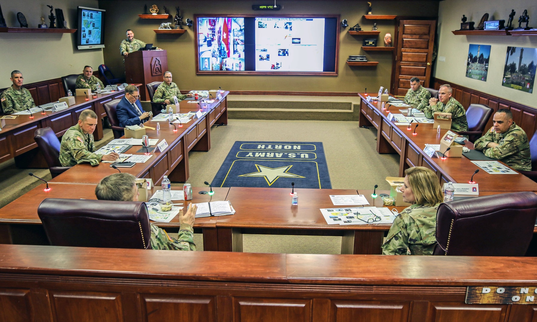 U.S. Army North staff conduct a briefing with Gen. James C. McConville