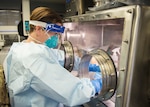 U.S. Army Capt. Joyce Avedisian, 14th Civil Support Team nuclear medical science officer, prepares to test patient samples for COVID-19 in an analytical laboratory system vehicle parked outside Charter Oak Family Health Center in Hartford, Connecticut, April 24, 2020. The Connecticut National Guard’s 14th Civil Support Team is working in partnership with the Connecticut Department of Public Health state lab to test samples from 70 to 80 patients per day in locations throughout the state.