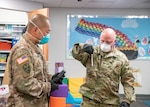 Sgt. 1st Class Brad Convery and Sgt. 1st Class Brian Tomasek, members of the West Virginia National Guard’s Task Force Chemical, Biological, Radiological and Nuclear (CBRN) Response Enterprise (CRE) (TF-CRE), conduct surface swabbing procedures to measure contaminants during operations to sanitize spaces at a daycare facility in Scott Depot, West Virginia, April 25, 2020. TF-CRE utilized multiple Aerosolized Hydrogen Peroxide (AHP) systems to fog rooms within the facility, helping to clean the rooms and combat the possible spread of the infectious COVID-19 pandemic virus. (U.S. Army National Guard photo by Edwin L. Wriston)