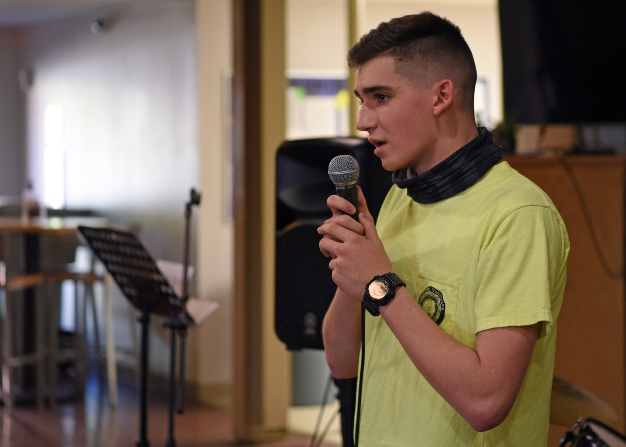 U.S. Air Force Airman 1st Class Nicholas Fegely, 316th Training Squadron student, sings an acapella cover of Baltimore by Hodera at Crossroads on Goodfellow Air Force Base, Texas, April 24. Fegely was one of three performances to compete in the virtual talent show. (U.S. Air Force photo by Airman 1st Class Ethan Sherwood)