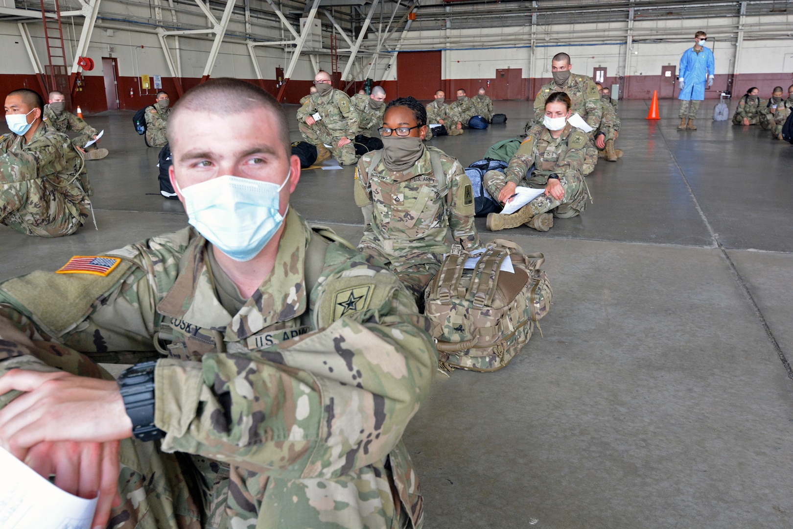 Soldiers wait in formation