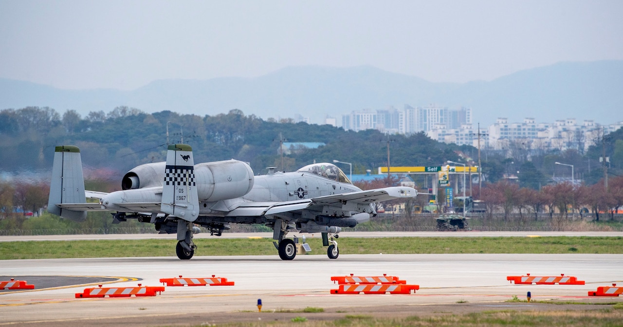 An A-10C Thunderbolt II taxiing down a runway.