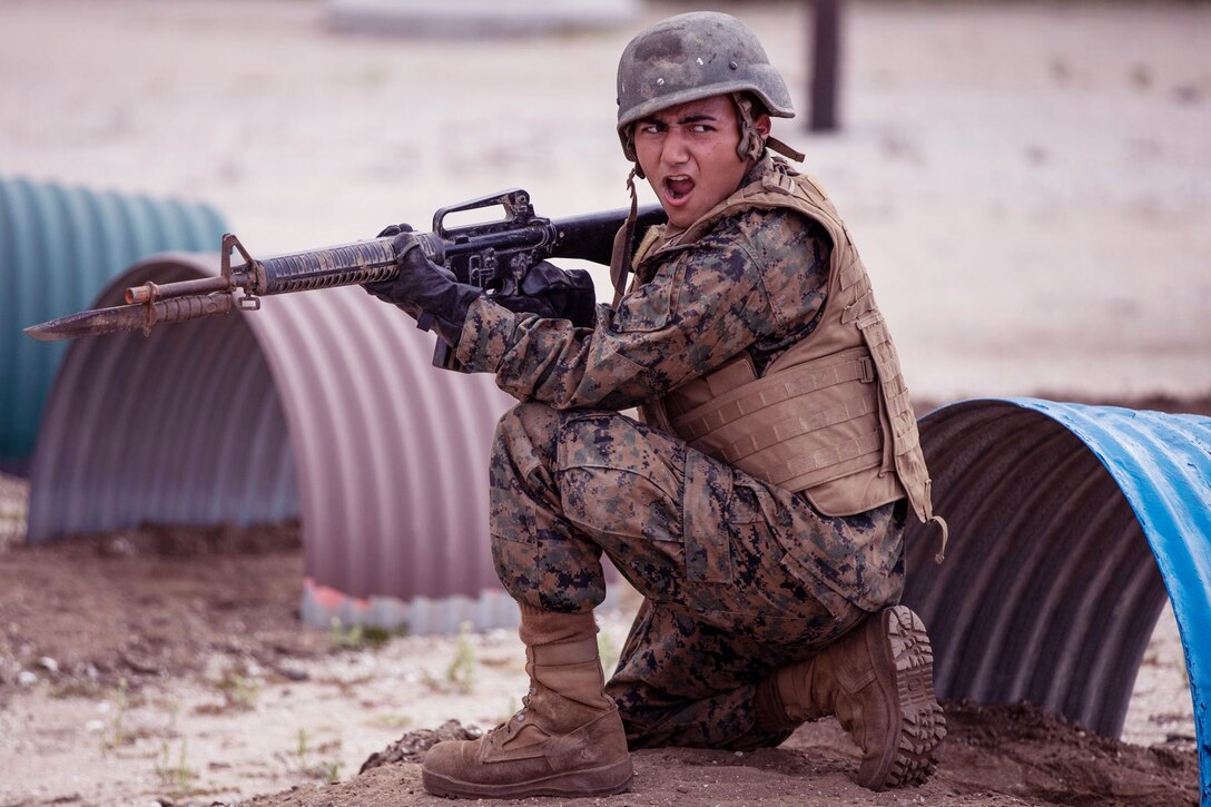 A recruit with Fox Company, 2nd Recruit Training Battalion participates in the Bayonet Assault course at Marine Corps Recruit Depot, San Diego, April 21, 2020.