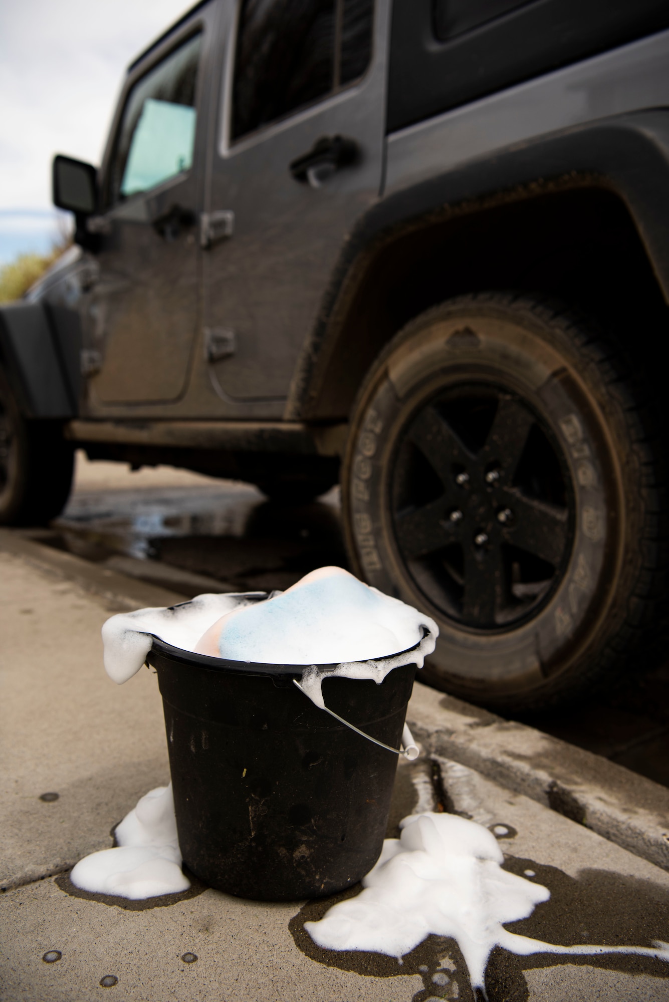 Airmen prepare to hold a car wash, April 22, 2020, at Mountain Home Air Force Base, Idaho. Airmen from the 366th OSS have been giving back to the community by helping do day-to-day tasks for families during the COVID-19 pandemic. (U.S. Air Force photo by Airman 1st Class Andrew Kobialka)