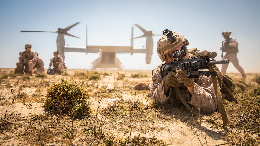 A U.S. Marine posts security during a tactical recovery of aircraft and personnel exercise on Karan Island, Kingdom of Saudi Arabia, April 23, 2020.