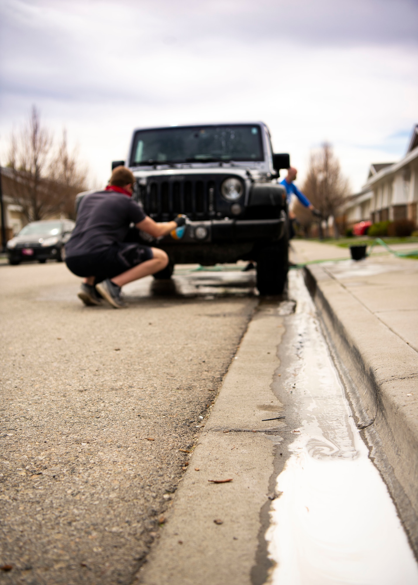 Airman 1st Class Christopher Ivers, 366th Operations Support Squadron air traffic controller, cleans a car, April 22. 2020, at Mountain Home Air Force Base, Idaho. Airmen from the 366th OSS have been giving back to the community by helping do day-to-day tasks for families during the COVID-19 pandemic. (U.S. Air Force photo by Airman 1st Class Andrew Kobialka)