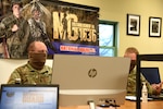 Sgt. First Class Jason Brautigam, left, and Staff Sgt. Michael Perry, recruiting and retention noncommissioned officers, Michigan Army National Guard, conduct a question-and-answer session via the internet due to social distancing restrictions caused by the COVID-19 pandemic, Dowagiac, Michigan, April 24, 2020.