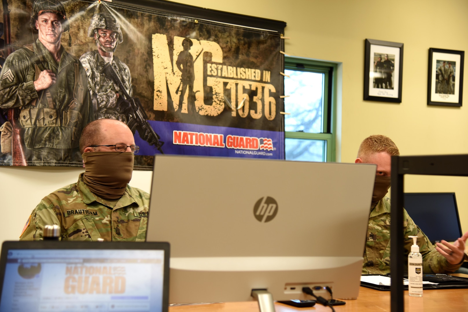 Sgt. First Class Jason Brautigam, left, and Staff Sgt. Michael Perry, recruiting and retention noncommissioned officers, Michigan Army National Guard, conduct a question-and-answer session via the internet due to social distancing restrictions caused by the COVID-19 pandemic, Dowagiac, Michigan, April 24, 2020.
