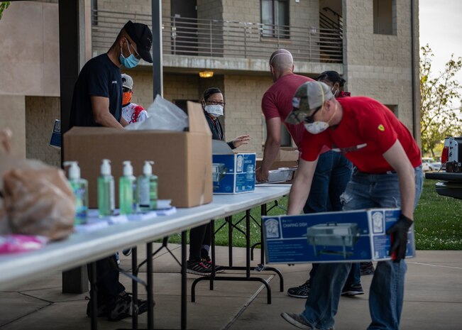 Volunteers prepare hot meals for Beale's dorm residents.