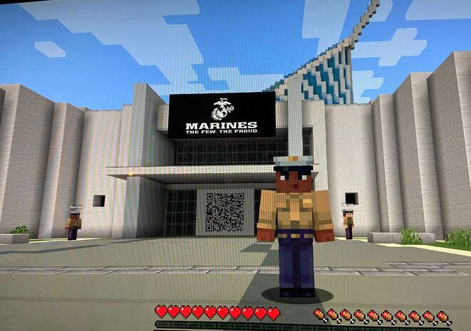 A Marine Corps Minecraft avatar stands in front of the digitally-replicated National Museum of the Marine Corps during the Digital Penn Relays, April 24, 2020. In the midst of the Coronavirus pandemic, the Penn Relays, which is the largest and oldest track and field event in the United States, was moved online as a way to continue connecting with schools, athletes, coaches, vendors and fans. All participants logged in to Minecraft, a video game known for its pixelated style, where they entered a virtual version of Franklin Field, the typical setting for the Penn Relays. Here, players competed against each other in four track and field themed obstacle courses, one of which was a Marine Corps obstacle course. Players could also go outside of Franklin Field to this virtually built replica of the National Museum of the Marine Corps, where they could scan a real life QR code for more information about service in the Marine Corps. (Marine Corps photo by Cpl. Naomi May)