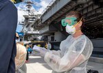 Theodore Roosevelt Sailors volunteer to support public health outbreak investigation