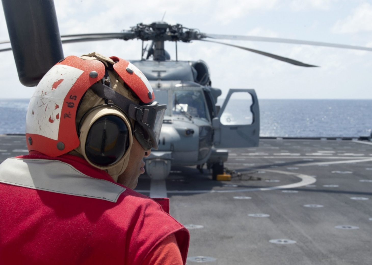 Chief Quartermaster Jarrod Collins, assigned to the Independence-variant littoral combat ship USS Gabrielle Giffords (LCS 10), stands fire watch during flight quarters, March 13, 2020. Gabrielle Giffords, part of Commander, Destroyer Squadron Seven, is on a rotational deployment, operating in the U.S. 7th Fleet area of operations to enhance interoperability with partners and serve as a ready-response force.