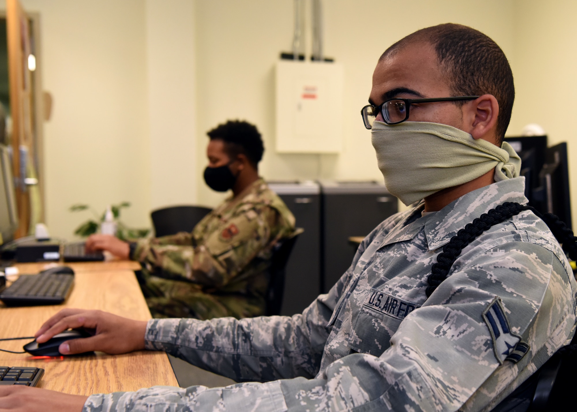 U.S. Air Force Airman 1st Class Quanah Roberts, 316th Training Squadron student, social distances and wears a mask while attending the in-classroom portion of his Apprentice Electronic Signals Intelligence Analyst (1N2A) course inside Fred Sebers Hall on Goodfellow Air Force Base, Texas, April 20, 2020. The course was the first-level training for Electromagnetic Spectrum Theory and Radar Theory, with two-thirds of its material taught through distance learning. (U.S. Air Force Photo by Airman 1st Class Abbey Rieves)