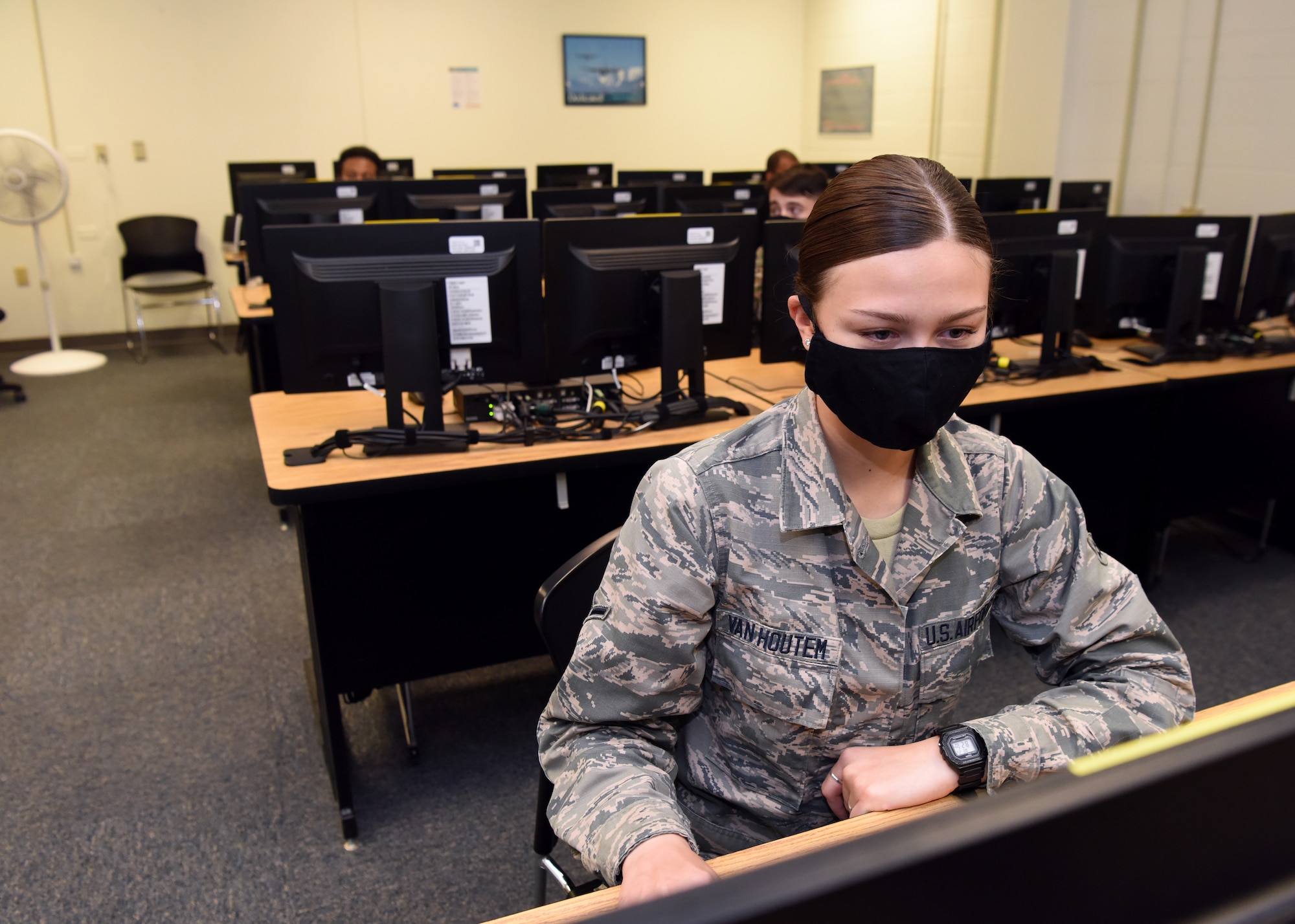 U.S. Air Force Airman Megan Van Houtem, 316th Training Squadron student, reviews her Apprentice Electronic Signals Intelligence Analyst (1N2A) course materials inside Fred Sebers Hall on Goodfellow Air Force Base, Texas, April 20, 2020. Classroom occupant capacity was downsized for the in-classroom portion section of the course to combat COVID-19. (U.S. Air Force Photo by Airman 1st Class Abbey Rieves)