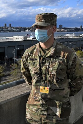 Army Warrant Officer Christopher Gallant, assigned to Bravo Company, 3rd Battalion, 142nd Aviation, New York Army National Guard, tested positive for COVID-19 in March, recovered, and is working as the safety officer at the Javits New York Medical Station in New York April 21, 2020.