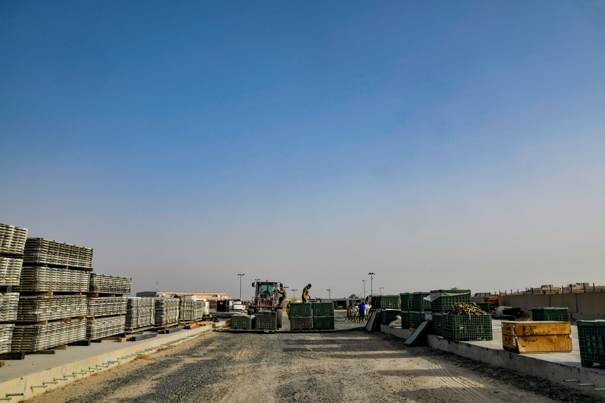 Photo of Airmen working on cargo nets