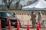 Colorado National Guard members conduct COVID-19 testing at a drive-up site in Greeley, Colorado, April 23, 2020. Nearly 70 Colorado National Guard members from the Chemical, Biological, Radiological, Nuclear and high-yield (CBRNE) Enhanced Response Force Package (CERFP) tested residents in the Greeley area.