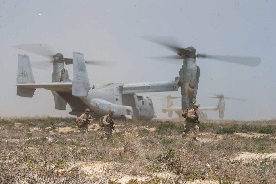 Marines assigned to Fox Company, Battalion Landing Team 2/8, 26th Marine Expeditionary Unit, exit an MV-22B Osprey to conduct platoon-level training on Kurayn Island, Saudi Arabia, April 22, 2020. The Bataan Amphibious Ready Group and 26th MEU, supported by air power from the Aviation Combat Element of the ARG/MEU, including AV-8B Harriers and attack helicopters, are conducting routine sustainment training in the U.S. 5th Fleet area of operations in order to enhance the Navy-Marine Corps team’s ability to employ low-signature, operationally relevant and strategically mobile crisis response forces to project power over key maritime terrain. (U.S. Marine Corps photo by Cpl. Tanner Seims)