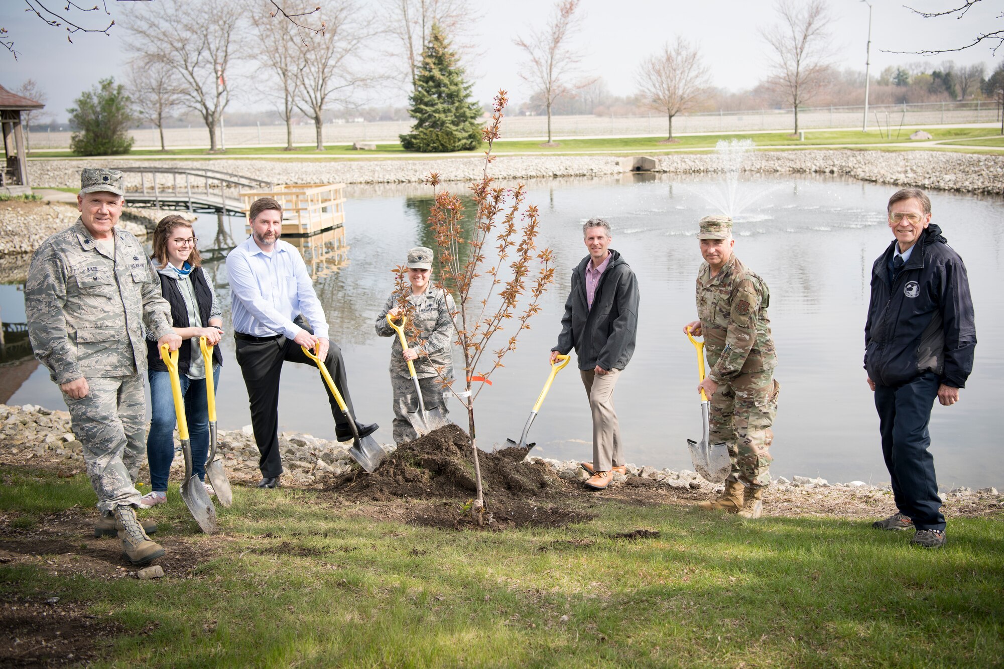 Grissom personnel pose for a photo during a special Arbor Day ceremony held here April 24, 2020. Each year Arbor Day is celebrated on the last Friday of April. Its celebration provides an opportunity to learn about trees and take positive action to make the world a better place. (U.S. Air Force photo/Master Sgt. Ben Mota)