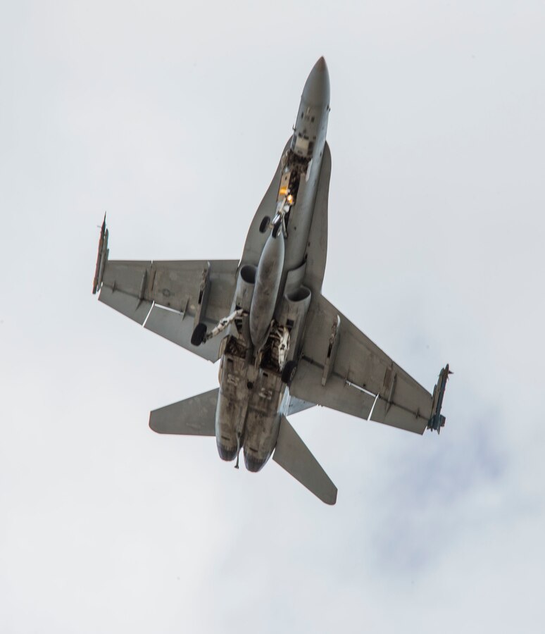 A U.S. Marine Corps F/A-18 assigned to Marine Fighter Attack Training Squadron 101, Marine Aircraft Group 11, 3rd Marine Aircraft Wing, takes off at Marine Corps Air Station Miramar, Calif., March 26, 2020. 3rd MAW continues its daily operations and mission essential tasks while enforcing precautionary measures to mitigate the spread of COVID-19. (U.S. Marine Corps photo by Lance Cpl. Julian Elliott-Drouin)