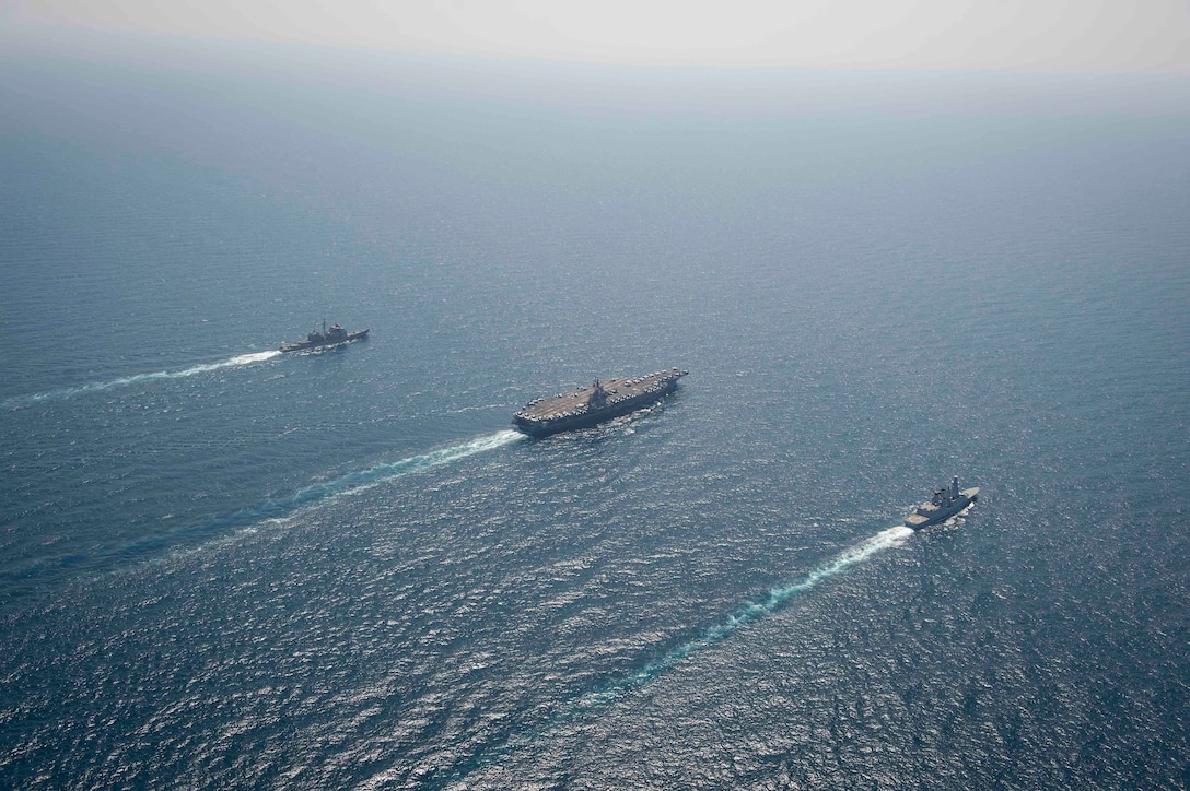 The aircraft carrier USS Dwight D. Eisenhower (CVN 69), center, the guided-middle cruiser USS San Jacinto (CG 56), left, and the French anti-air frigate Forbin (D620) conduct a group-sail exercise in the Arabian Sea, April 25, 2020. Ike, San Jacinto and Forbin are operating under national tasking, as they participate in a bilateral, interoperability exercise to strengthen partnership between the U.S. and French navies. (U.S. Navy photo by Mass Communication Specialist 3rd Class Sophie A. Pinkham)