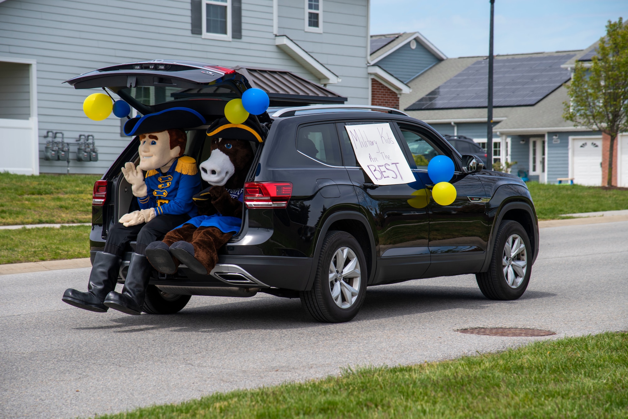 Caesar Rodney and Spirit, mascots from Caesar Rodney school district, sit in the rear of a "Teachers' Parade" April 28, 2020, at Dover Air Foce Base, Del. Despite the closure of Delaware school due to COVID-19, Teachers from Welch Elementary and Dover Air Base Middle School found time to celebrate Month of the Military Child which dedicates the month of April to honoring the sacrifices made by military families. (U.S. Air Force photo by Airman 1st Class Jonathan Harding).