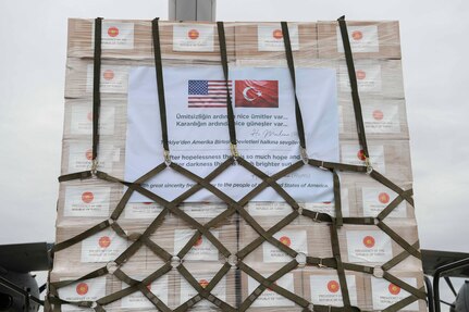 A quote is displayed on the outside of a pallet of boxes containing medical supplies at Joint Base Andrews, Md., Apr. 28, 2020. A Turkish Airbus A400M Atlas landed at JBA with equipment to respond to the coronavirus pandemic and support a NATO Ally. (U.S. Air Force photo by Airman 1st Class Spencer Slocum)