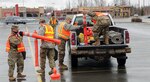 Alaska National Guard Soldiers and Airmen, Alaska State Defense Force Soldiers and Naval Militiamen assigned to a joint task force supported the Food Bank of Alaska by establishing an efficient food distribution area in Muldoon April 20, 2020.