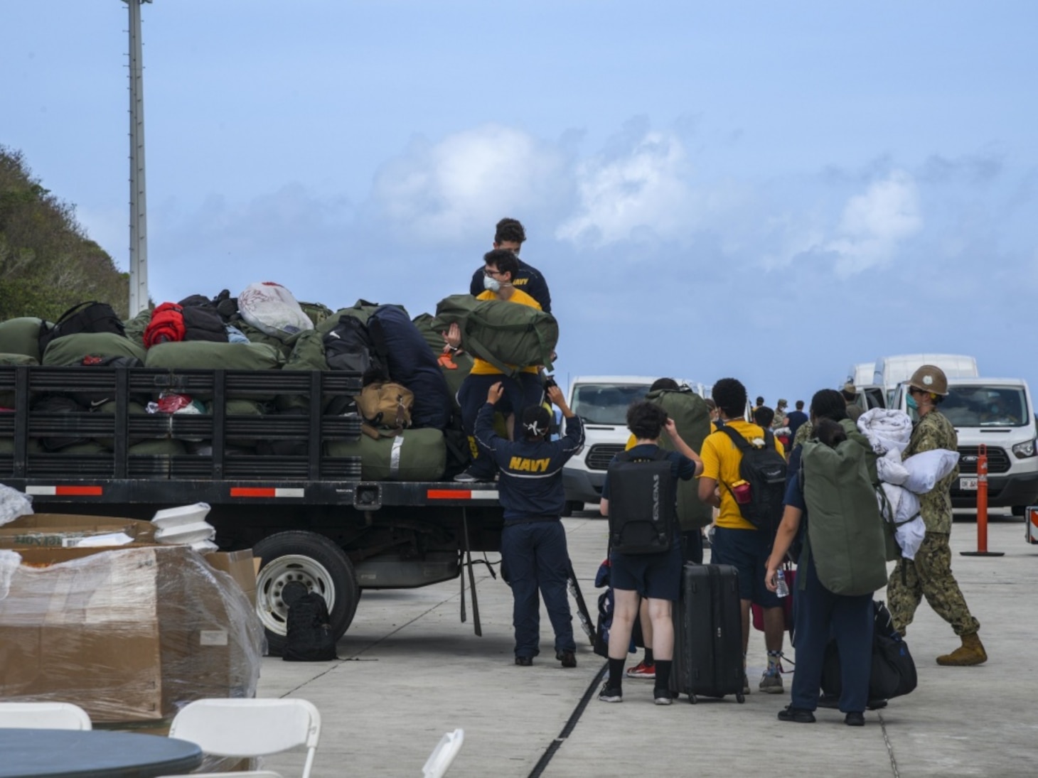 USS Theodore Roosevelt's (CVN 71) essential watch standers and cleaning team conducted a crew swap April 29, turning over a clean ship to a COVID negative crew after completion of their off-ship quarantine or isolation. Thousands of Sailors from Theodore Roosevelt were moved to local hotels in an effort to implement an aggressive mitigation strategy to minimize the spread of COVID-19 and protect the health of the Sailors.