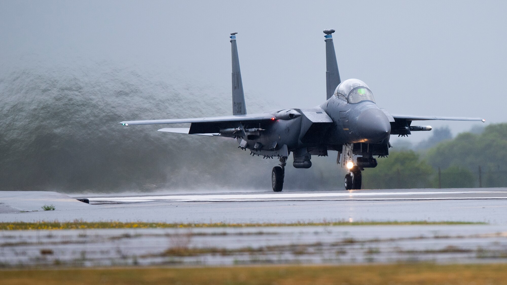 An F-15E Strike Eagle assigned to the 492nd Fighter Squadron prepares to take off from Royal Air Force Lakenheath, England, April 28, 2020. The 48th Fighter Wing continues to maintain mission-readiness in order to safeguard U.S. national interests and those of our allies and partners, despite the current COVID-19 crisis. (U.S. Air Force photo by Airman 1st Class Jessi Monte)