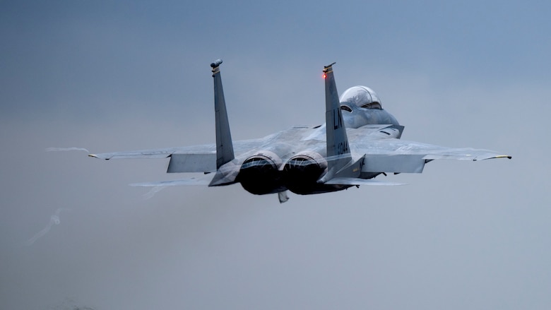 An F-15C Eagle assigned to the 493rd Fighter Squadron takes off from Royal Air Force Lakenheath, England, April 28, 2020. Despite the current COVID-19 crisis, the 493rd FS conducts routine training to ensure the Liberty Wing brings unique air combat capabilities to the fight when called upon by U.S. Air Forces in Europe-Air Forces Africa. (U.S. Air Force photo by Airman 1st Class Jessi Monte)
