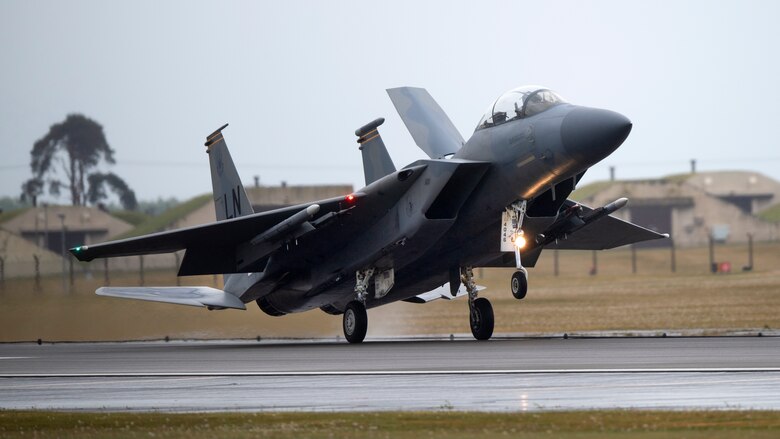 An F-15D Eagle assigned to the 493rd Fighter Squadron lands at Royal Air Force Lakenheath, England, April 28, 2020. Despite the current COVID-19 crisis, the 493rd FS conducts routine training to ensure the Liberty Wing brings unique air combat capabilities to the fight when called upon by U.S. Air Forces in Europe-Air Forces Africa. (U.S. Air Force photo by Airman 1st Class Jessi Monte)
