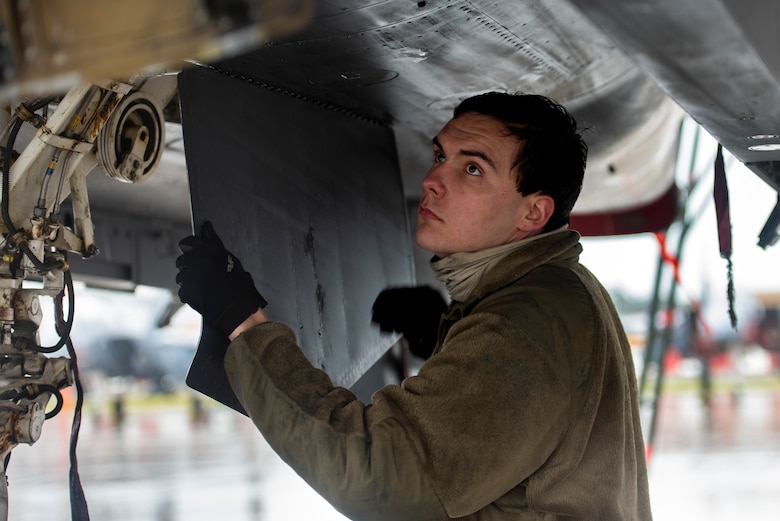 A 494th Fighter Squadron Aircraft Maintenance Unit crew chief conducts post-flight inspections following a training flight at Royal Air Force Lakenheath, England, April 28, 2020. Despite the current COVID-19 crisis, the 48th Fighter Wing is committed to staying ready to deliver combat air power when called upon by U.S. Air Forces in Europe-Air Forces Africa. (U.S. Air Force photo by Airman 1st Class Jessi Monte)