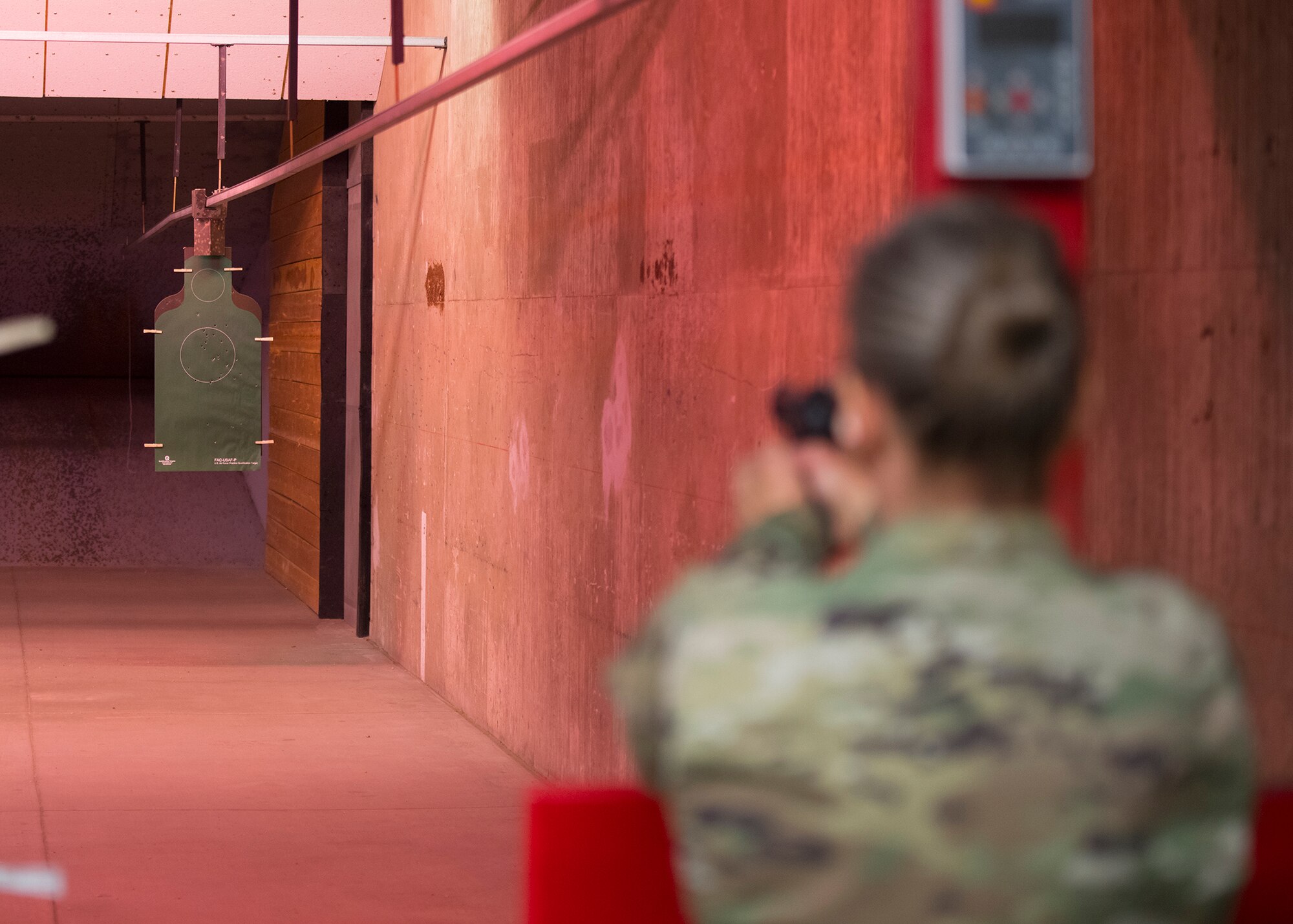 Lt. Col. Deborah Davidson, 341st Medical Operations Squadron commander, fires an M9 pistol April 15, 2020, at Luke Air Force Base, Ariz.