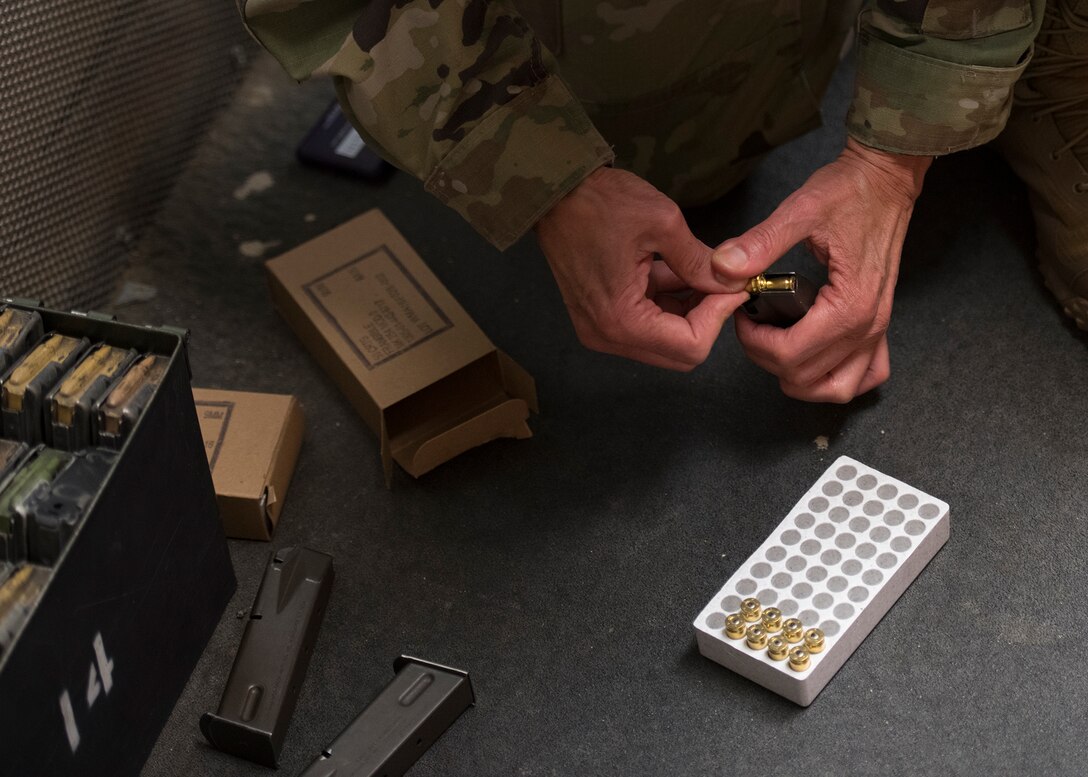 Lt. Col. Deborah Davidson, 341st Medical Operations Squadron commander, loads an M9 pistol magazine April 15, 2020, at Luke Air Force Base, Ariz.