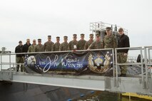 Senior Marine Corps and Navy leaders pose onboard the USS John Warner (SSN-785) at Naval Station Norfolk, Norfolk, Virginia, Jan. 31, 2020. Leaders toured the vessel to become familiar with the ship’s capabilities, increasing naval integration. The USS John Warner is a Virginia-class fast-attack submarine launched on Sept. 10, 2014. (U.S. Marine Corps Photo by Sgt. Danielle Prentice/released)