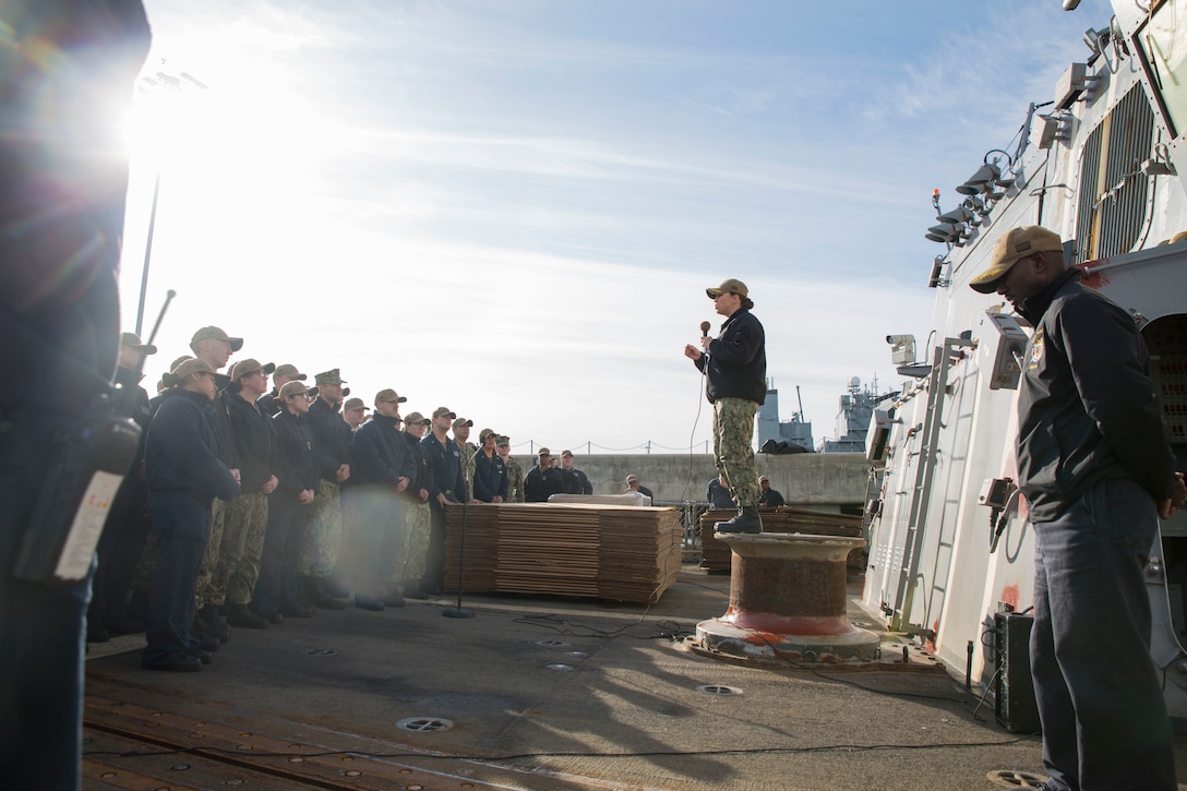 U.S. Navy Cmdr. Mary Devine, Commanding Officer of the USS Bainbridge (DDG-96) speaks to Sailors prior to a U.S. Marine Corps and U.S. Navy leadership tour aboard USS Bainbridge at Naval Station Norfolk, Norfolk, Virginia, Jan. 31, 2020. The tour was held to familiarize U.S. Marine Corps leaders with the capabilities of the vessel, increasing naval integration. The USS Bainbridge is an Arleigh Burke-class guided missile destroyer. (U.S. Marine Corps Photo by Cpl. Desmond Martin/released)