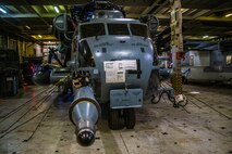U.S. Marines with Marine Heavy Helicopter Squadron 463, Marine Aircraft Group 24, stage their aircraft aboard a vehicle carrier vessel on Joint Base Pearl Harbor-Hickam, April 24, 2020. HMH-463 offloaded a CH-53E following a maintenance operation overseas. (U.S. Marine Corps photo by Lance Cpl. Jacob Wilson)