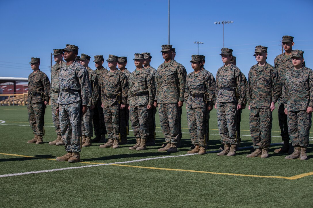 U.S. Marines stationed at Marine Corps Air Station (MCAS) Yuma conduct sword manual and drill as part of their final examination for the Corporals Course curriculum on the MCAS Yuma Ramada field, Jan 27, 2019. Corporals Course is a leadership class designed to teach Marines the fundamentals that go in to being an effective noncomissioned officer. (U.S. Marine Corps photo by Lance Cpl John Hall)