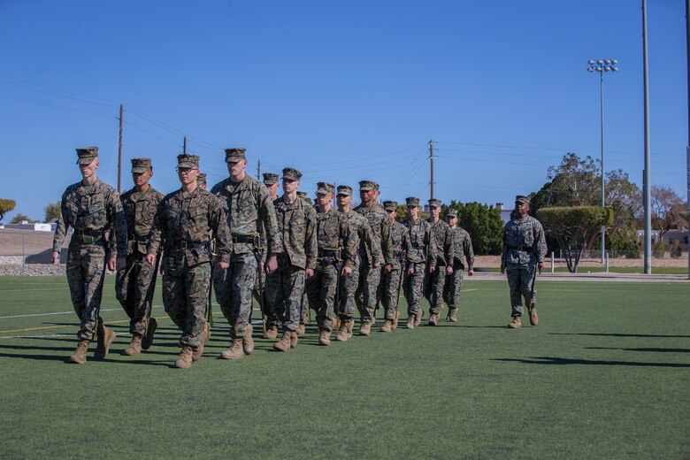 U.S. Marines stationed at Marine Corps Air Station (MCAS) Yuma conduct sword manual and drill as part of their final examination for the Corporals Course curriculum on the MCAS Yuma Ramada field, Jan 27, 2019. Corporals Course is a leadership class designed to teach Marines the fundamentals that go in to being an effective noncomissioned officer. (U.S. Marine Corps photo by Lance Cpl John Hall)