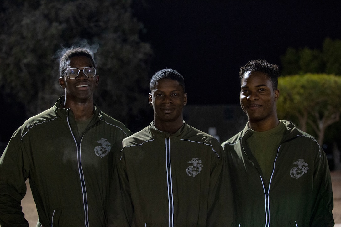 U.S. Marines and Sailors assigned to Headquarters and Headquarters Squadron (H&HS) participate in a squadron physical training (PT) session on Marine Corps Air Station (MCAS) Yuma, Ariz., Jan. 10, 2020.