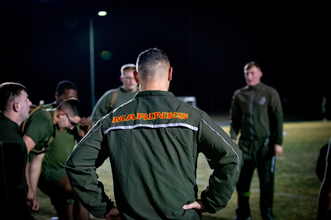 U.S. Marines and Sailors assigned to Headquarters and Headquarters Squadron (H&HS) participate in a squadron physical training (PT) session on Marine Corps Air Station (MCAS) Yuma, Ariz., Jan. 10, 2020.