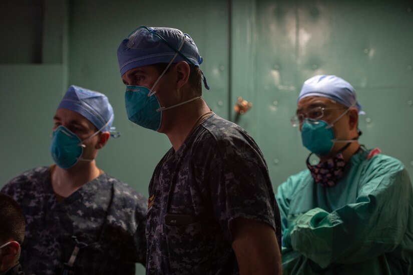 Sailors review a radiology study.