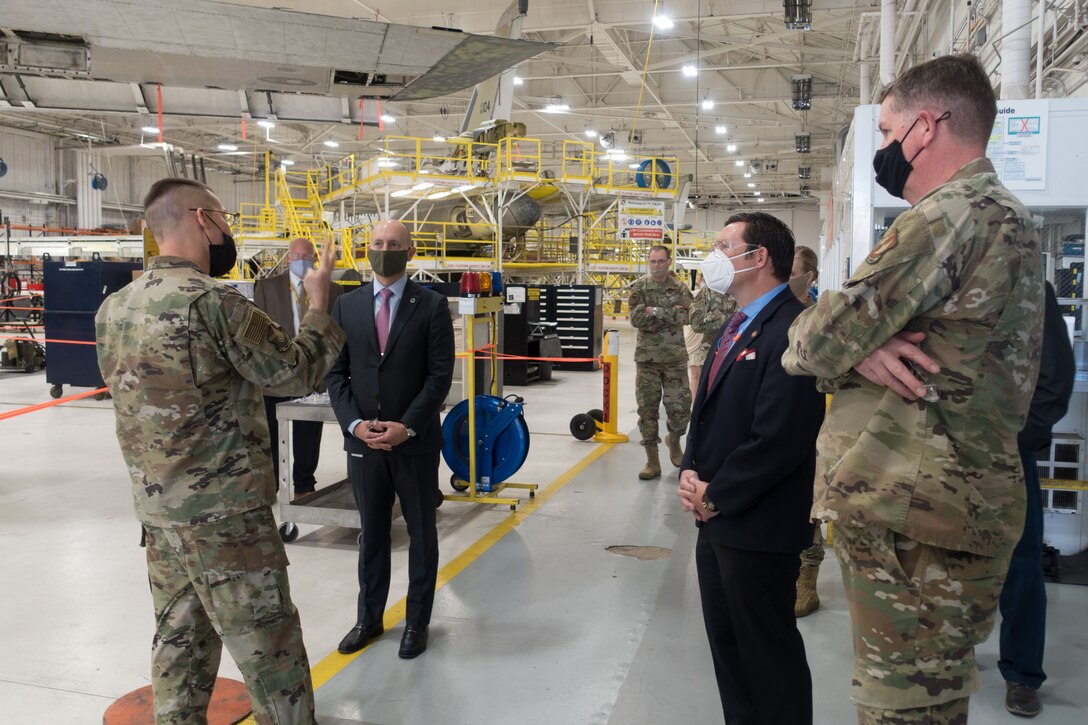 Col. Gregory Lowe, 76th Aircraft Maintenance Group commander, gives the Honorable Shon Manasco a briefing about sustainment operations during his visit to Tinker Air Force Base, Oklahoma, April 29, 2020.  While performing the duties of Under Secretary of the Air Force Manasco Manasco visited several locations across the base to gain a better understanding of recent changes caused by the coronavirus outbreak.  (U.S. Air Force photo by 2Lt. Danny Rangel)
