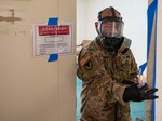 Sgt. 1st Class Brian Tomasek with the West Virginia National Guard’s Task Force Chemical, Biological, Radiological and Nuclear (CBRN) Response Enterprise (CRE) (TF-CRE), collects post sanitization swabs from a conference room after it was sanitized with a Aerosolized Hydrogen Peroxide (AHP) system as part of a demonstration of its disinfection capabilities at the West Virginia Capitol Complex Charleston, West Virginia, April 29, 2020. The three man team form TF-CRE is teaching employees from the State of West Virginia Department of Administration General Services Division how to use the AHP system to clean rooms and combat the possible spread of the infectious COVID-19 pandemic virus.